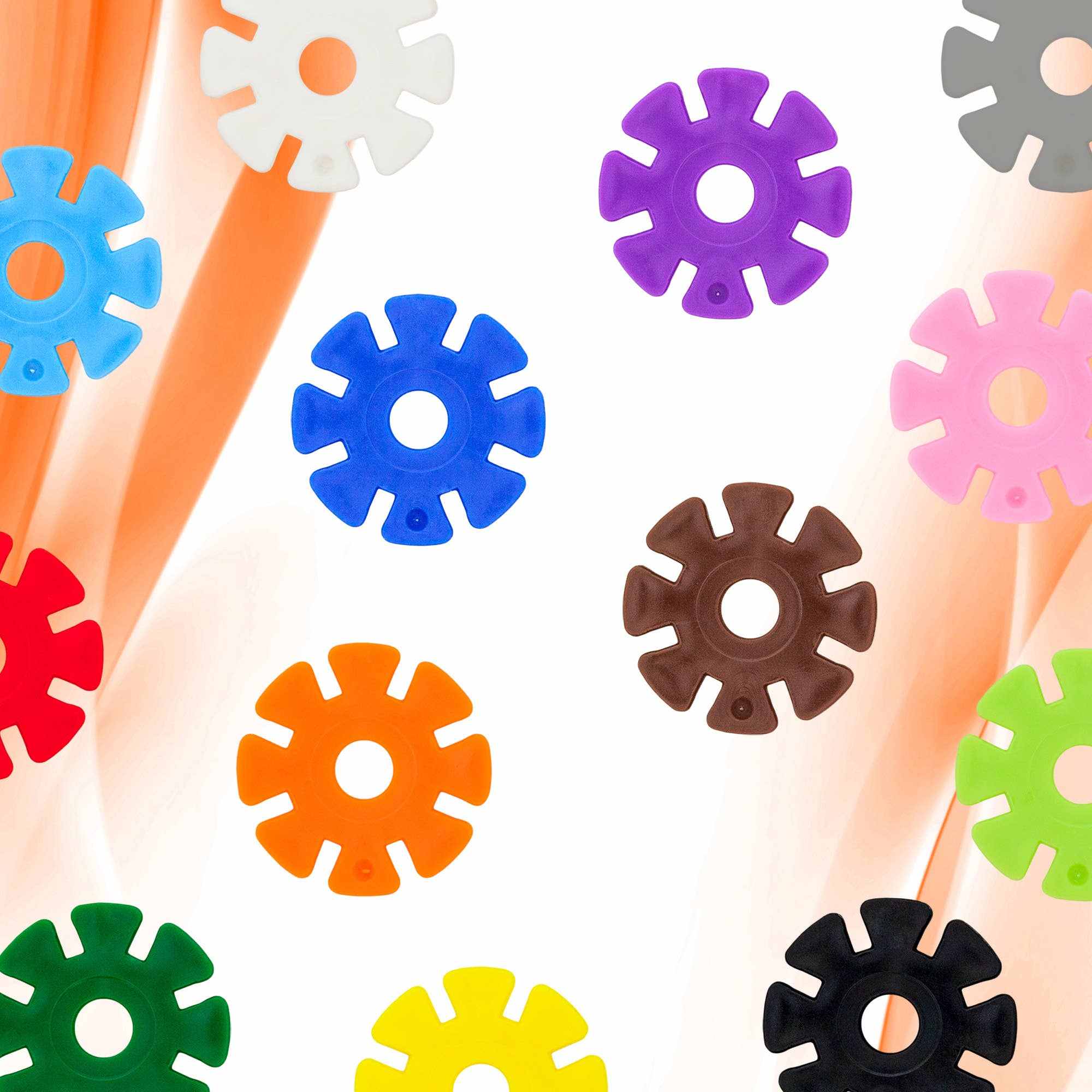 Colorful PicassoTiles 300pc Building Chips interlocking disc blocks in various vibrant colors isolated on white background