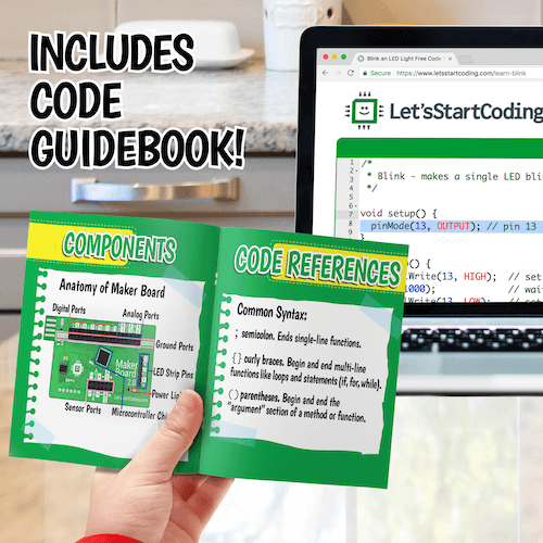 Child holding the Ultimate Coding Kit guidebook with coding instructions displayed on laptop screen in the background.