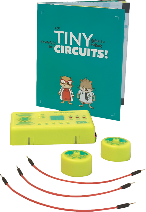 Tiny Circuits mini-microprocessor electronics kit with wires, buttons, and instruction manual for building circuits and games.