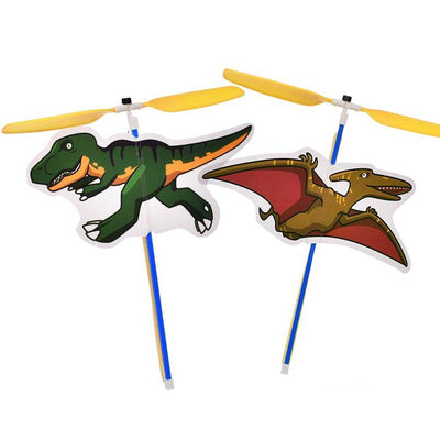 Band Powered Copter toy featuring T-Rex and Pterodactyl with yellow propellers and blue handles.