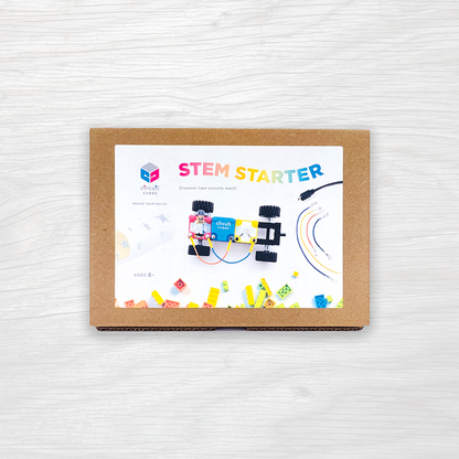 Circuit Cubes STEM Starter Kit with battery, motor, LED cubes, wheels, and LEGO-compatible bricks for kids aged 8+ learning circuits and motion.