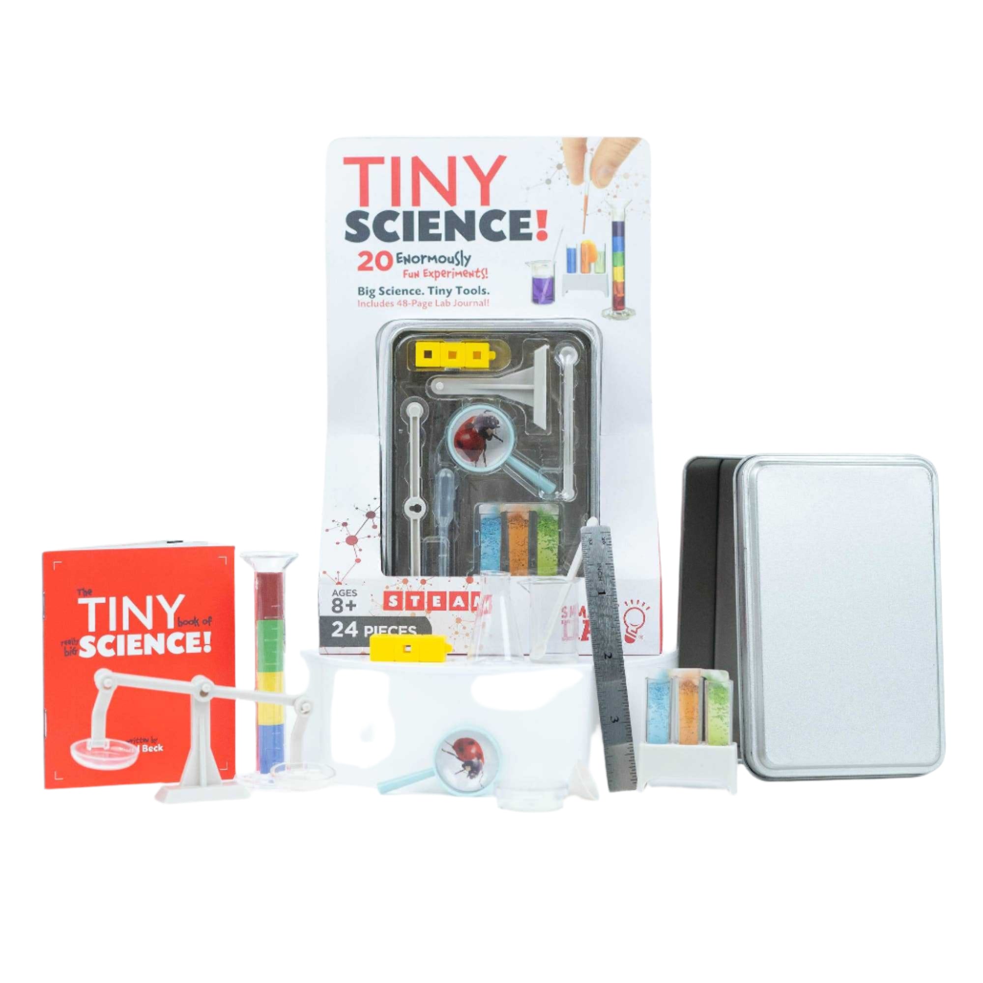 Tiny Science lab kit with miniature beakers, test tubes, and storage tin for experiments.