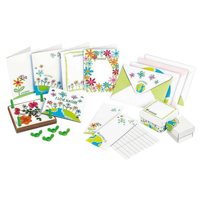 Pressed flower art kit with handmade greeting cards, envelopes, trinket boxes, and flower pressing tools for nature crafts.