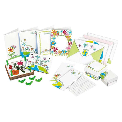 Pressed flower art kit with handmade greeting cards, envelopes, trinket boxes, and flower pressing tools for nature crafts.