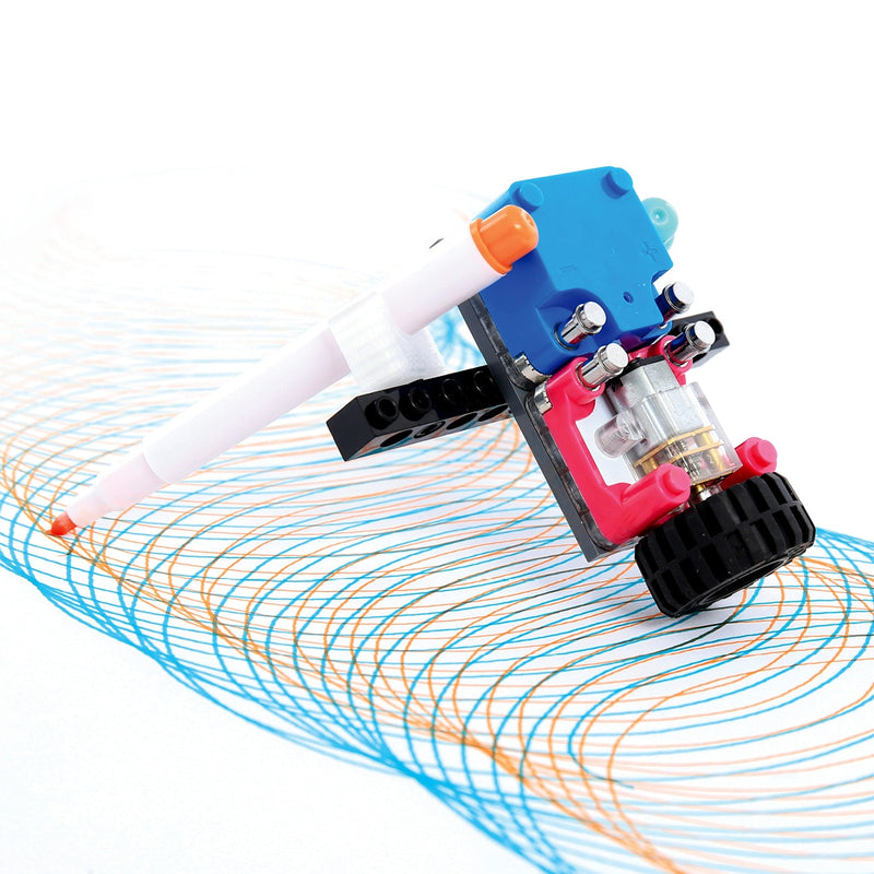 STEM Starter Kit circuit cube with motor and pen drawing colorful spirograph patterns on white background