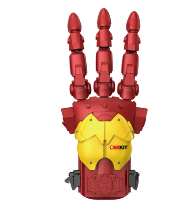 Red and yellow OWI Cyber Hand mechanical robotic hand model with articulated fingers and detailed joints, STEM educational kit.