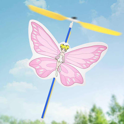 Band powered copter toy with pink pixy butterfly design flying against blue sky