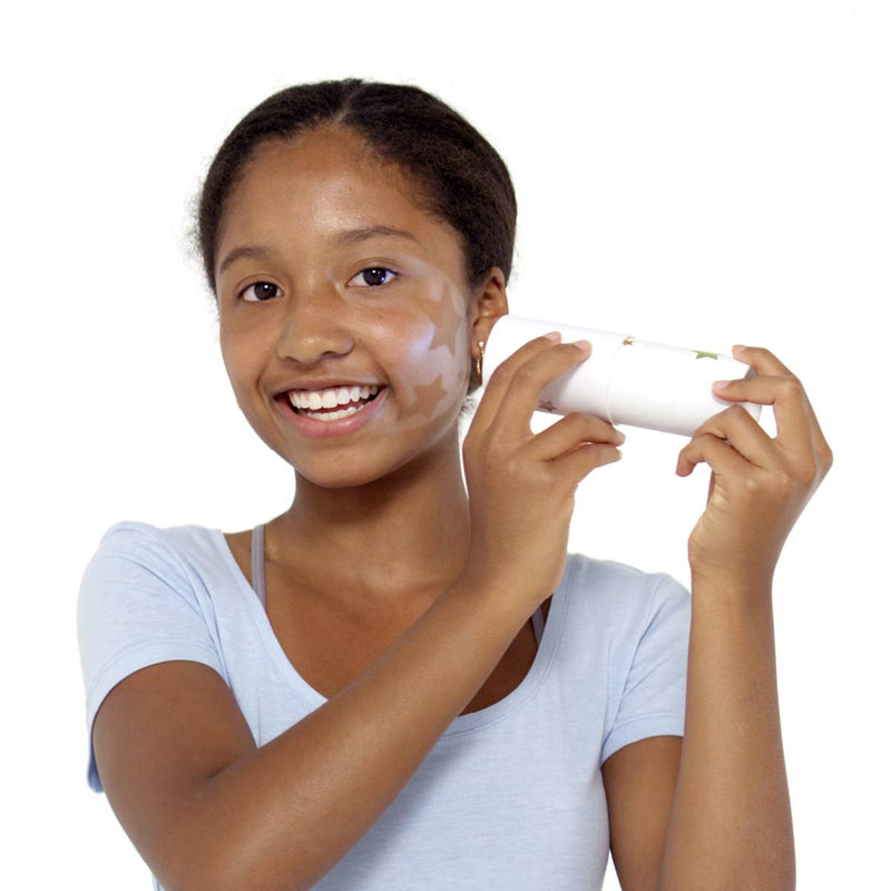 girl playing with STEM Starter Kit science project holding a homemade shaker toy